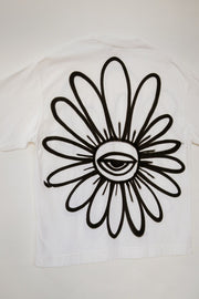Camiseta Spray "Olhar Floral" — Peça Única Oversized G