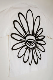Camiseta Spray "Olhar Floral" — Peça Única Oversized G