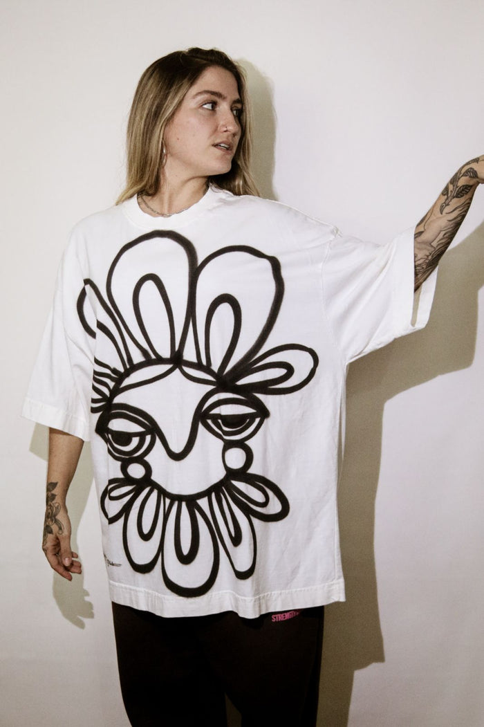 Camiseta Spray "Olhar Floral"